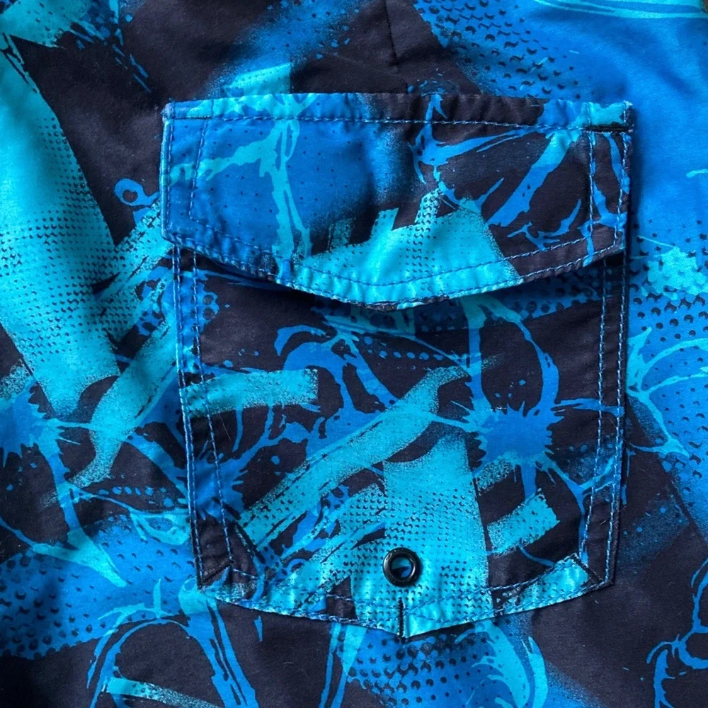 Oakley Blue &Black Floral Print Board Shorts Size 32  21”Length EUC